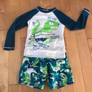 Gymboree swim trunks and rash guard, size 4